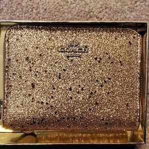 NWT Coach Gold Black Star glitter zip around Wallet